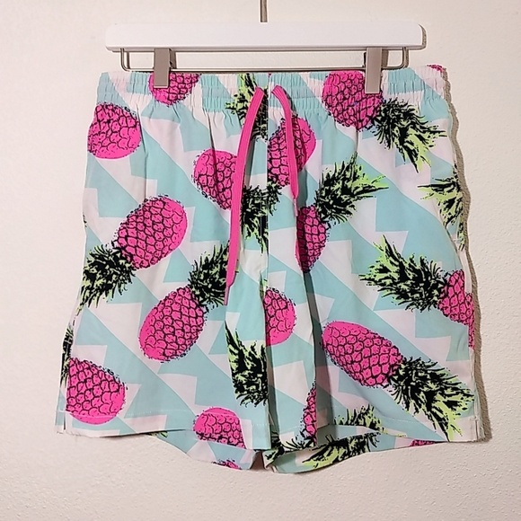 pink pineapple swim trunks
